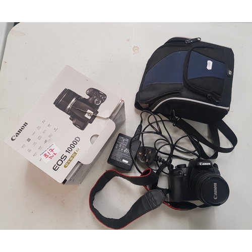 317 - A Canon EO5 1000D Camera with Carry Bag, Charger and Accessories