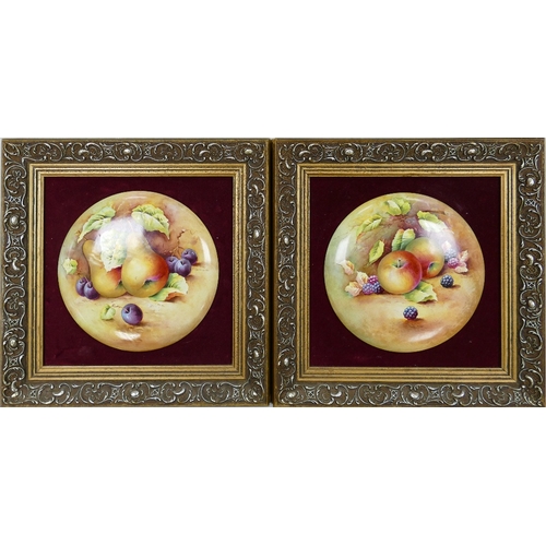 493 - Two signed circular hand painted fruit plaques by L. Woodhouse