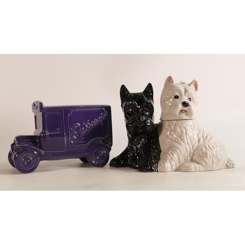 66 - Wade black & white dogs Whisky decanter together with a Cadbury Advertising money bank. These items ... 