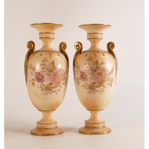 128 - A pair of Carlton ware Wiltshaw & Robinson Ivory Blush ware twin handled vases in the Rose and Curli... 