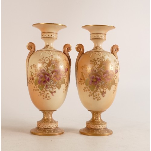 130 - A pair of Carlton ware Wiltshaw & Robinson Ivory Blush ware twin handled vases in a Pansy pattern. H... 