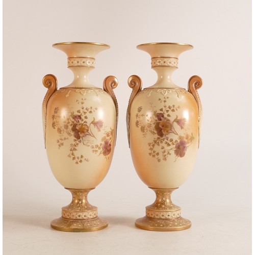 130 - A pair of Carlton ware Wiltshaw & Robinson Ivory Blush ware twin handled vases in a Pansy pattern. H... 