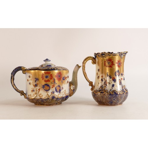 148 - Carlton ware Wiltshaw & Robinson Ivory Blush ware tea pot and pewter lidded jug. Decorated in heavil... 