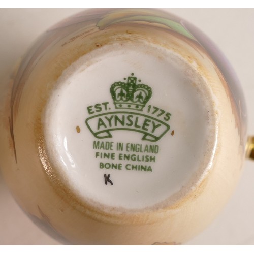 163 - Aynsley Orchard Gold items to include - two plates and two lidded vases signed by D. Plant together ... 