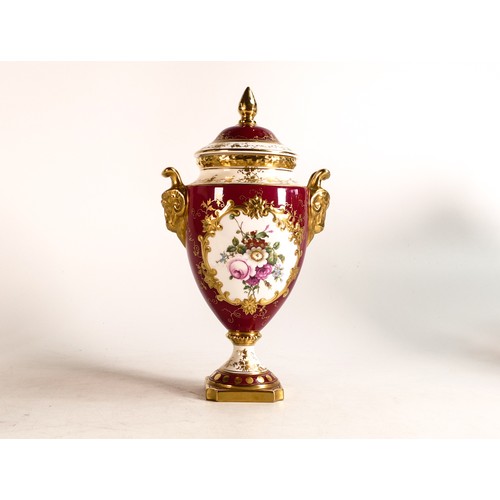 169 - Coalport gilded two handled vase & cover, hand painted with flowers on red ground, h.25cm.