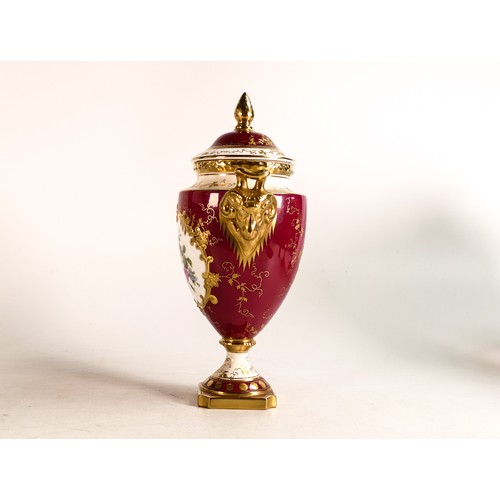 169 - Coalport gilded two handled vase & cover, hand painted with flowers on red ground, h.25cm.