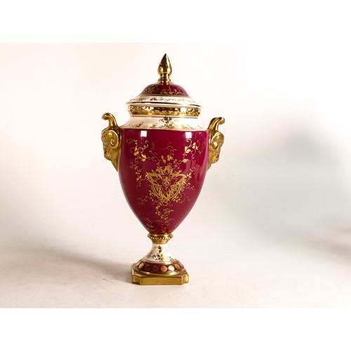 169 - Coalport gilded two handled vase & cover, hand painted with flowers on red ground, h.25cm.