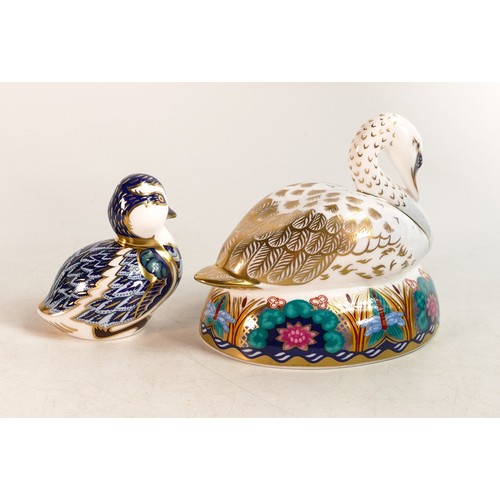 280 - Two Royal Crown Derby paperweights, Swan and sitting duckling, gold stopper, boxed. (2)