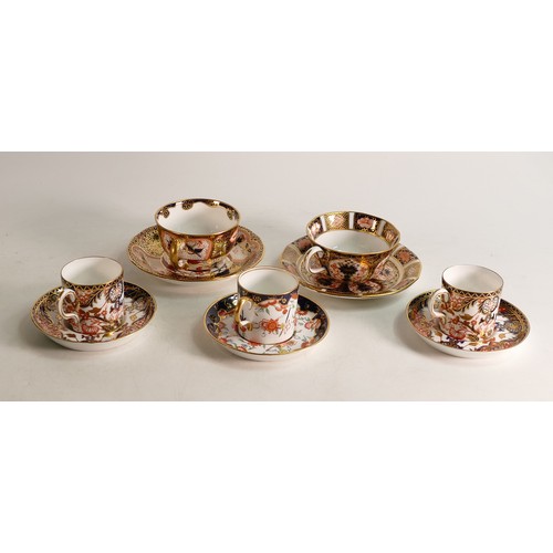 331 - A collection of Royal Crown Derby to include two coffee cans and saucers pattern 383, coffee can and... 