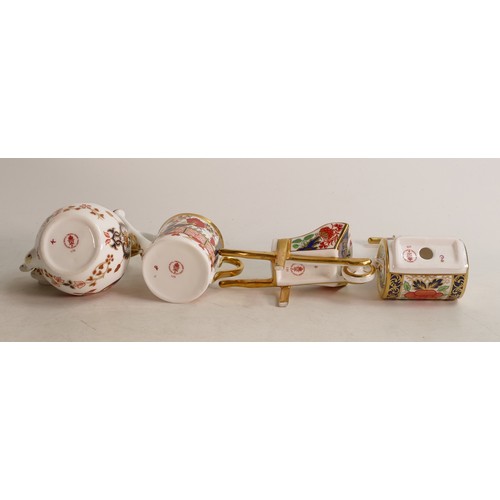 362 - A Royal Crown Derby Imari miniature model garden roller together with Watering Can, Wheelbarrow and ... 