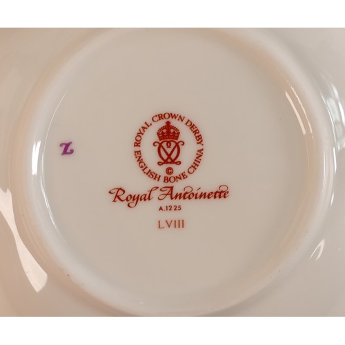 366 - A collection of Royal Crown Derby Royal Antionette to include pin dishes, vases, mantle clock, minia... 