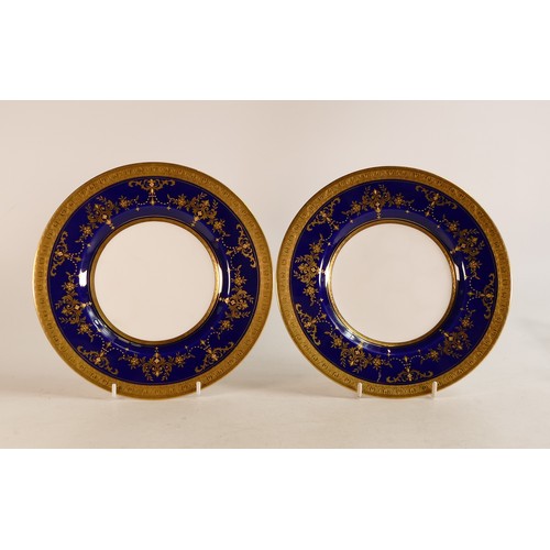 394 - Pair of Minton heavily gilded plates, d.22.5cm. (2)