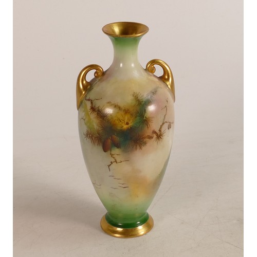 466 - Royal Worcester twin handled vase decorated with pheasants in woodland scene. Height 12cm