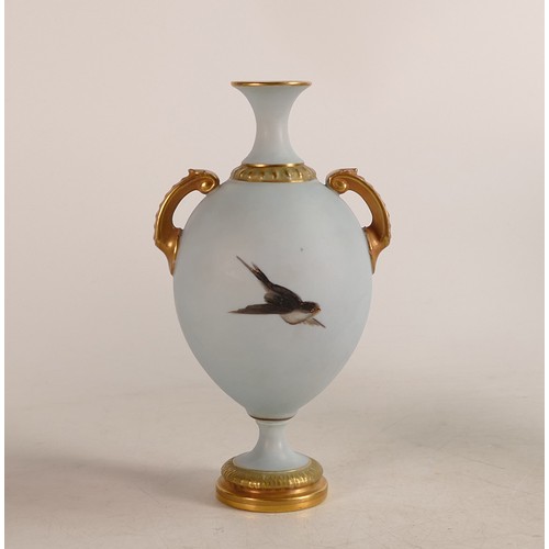 471 - George Johnson of Royal Worcester, twin handled Blush Ivory hand painted baluster vase. Painted with... 