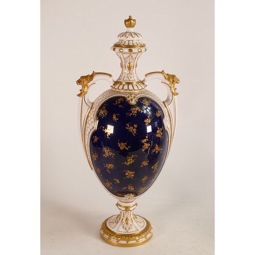 474 - A Royal Worcester twin handled vase, painted by Chivers, signed, with fruit in raised gilt cartouche... 