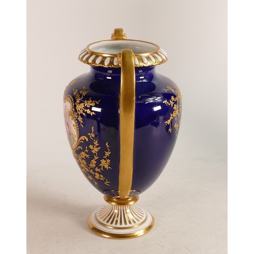 492 - A Royal Worcester hand painted twin handled vase. Painted with Orchid vignettes signed by Roberts. H... 