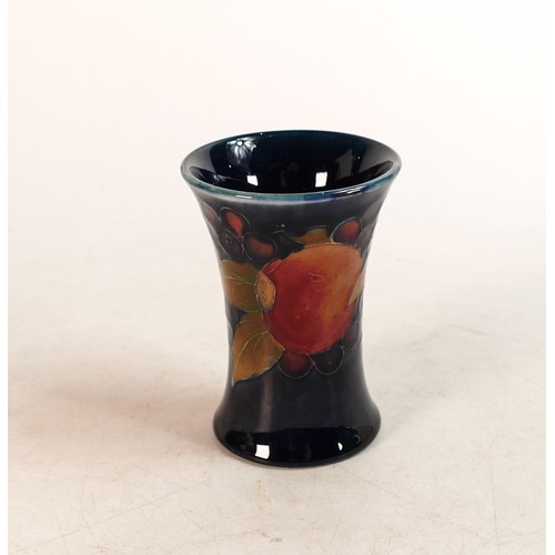 503 - Moorcroft Pomegranate small vase of waisted  form. Height:  8.9cm