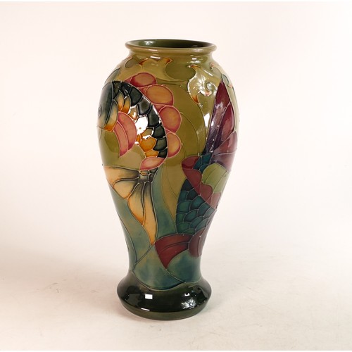 512 - Moorcroft Koi Carp on green ground vase, height 31.5cm.