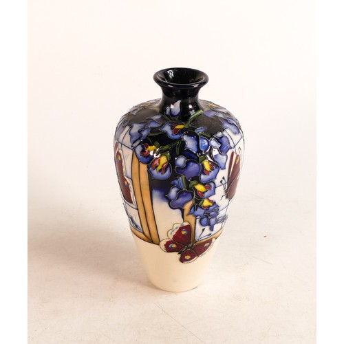 516 - Moorcroft vase in the Wisteria Flutter design. Red dot seconds. Height: 16cm