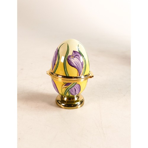 558 - Moorcroft enamel Crocus egg by J Horne. Boxed, height 6cm