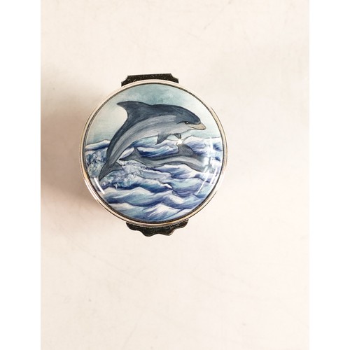 561 - Moorcroft enamel Manatee and Dolphins lidded box by J Horne. Limited edition 2/75. Boxed with certif... 