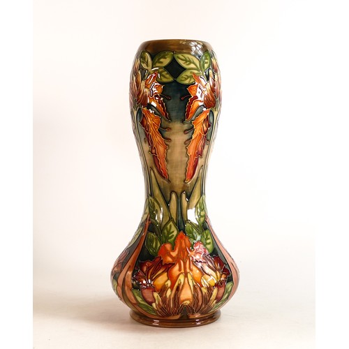 587 - Moorcroft Flame of the Forest vase, designed by Philip Gibson. Dated 1997 to the base. Height 29cm