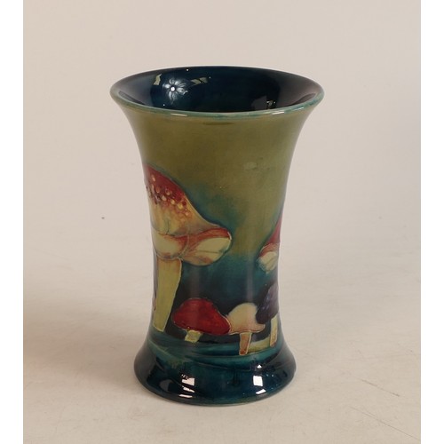 600 - William Moorcroft small vase decorated in the Claremont design, c1920s, h.11cm. Good condition.