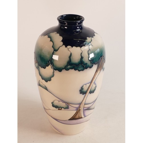 622 - A Moorcroft limited edition vase, in the 'Winter Trees' pattern, no.51/100, 23.5cm high, dated 2013,... 