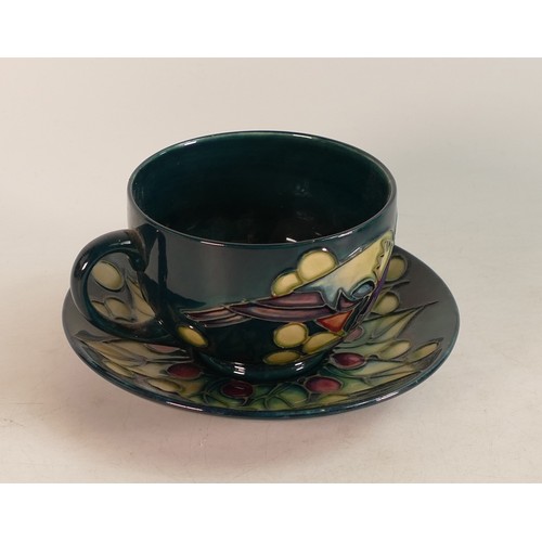 629 - Moorcroft Finch and Berry cup and saucer.