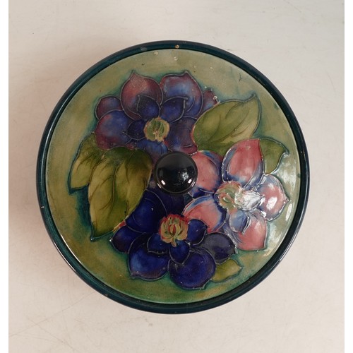 631 - Early Moorcroft Clematis powder bowl and cover, diameter 16cm.