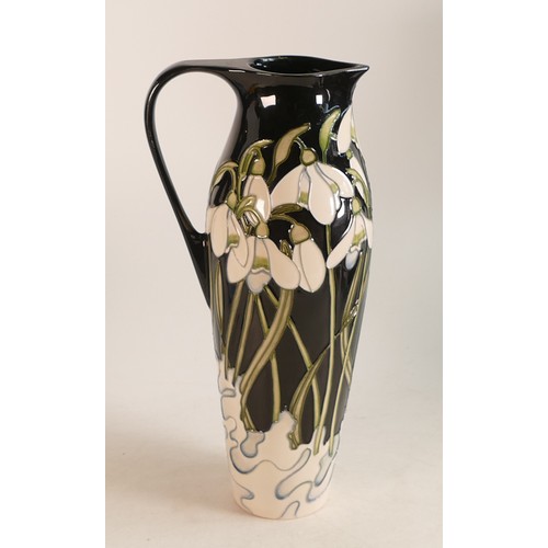 637 - Moorcroft jug in the Snowdrop pattern, trial piece dated 5/9/2005, height 27.5cm