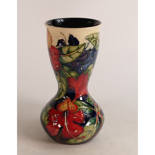 677 - Moorcroft Simeon vase, designed by Philip Gibson. Height 25cm, silver lined seconds