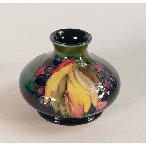 681 - Moorcroft Leaf & Berry squat vase on faded green/blue background, height 8cm