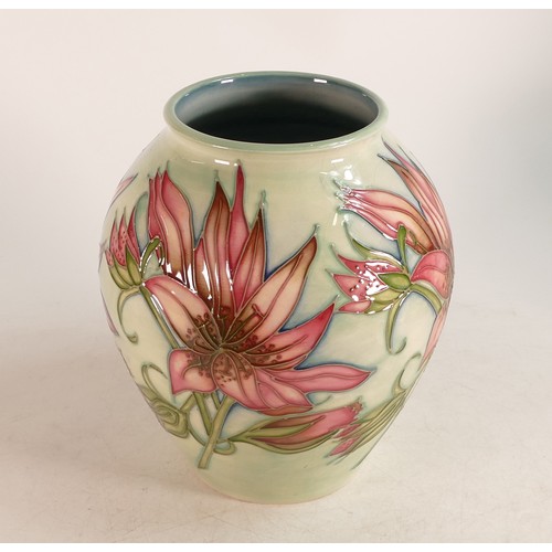 687 - Moorcroft large vase with pink flowers on pale blue ground, marked MCC 1998 to base. Collectors club... 