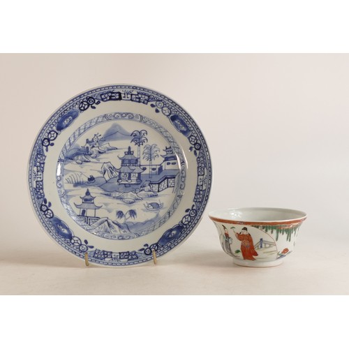 1668 - A 18th century or later Chinese Export blue and white plate decorated with exterior scenic landscape... 