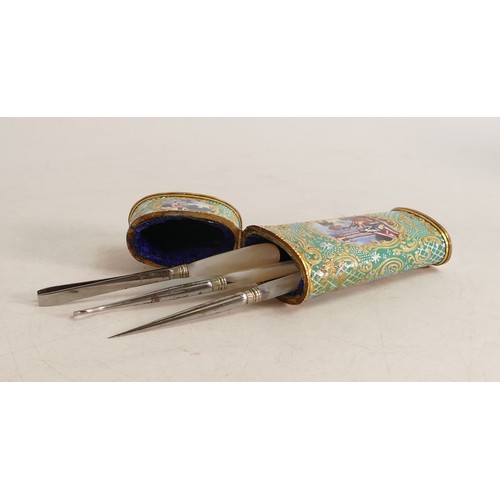 1679 - Gilt metal and enamelled Etui case with three implements. Length 10cm, damage to handle on 1 impleme... 