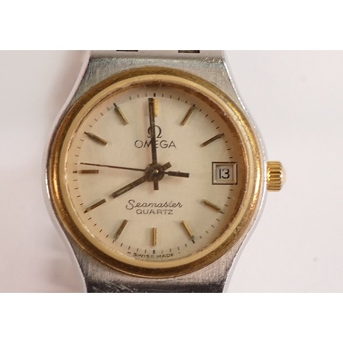 1861 - Omega Seamaster quartz ladies bi metallic wrist watch and integral bracelet.  Sold as not working, m... 