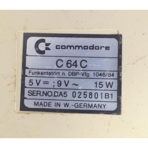 600H - A Commodore 64 Personal Computer C 64 C Ser. No. DA5 025801B1 Made in West Germany together with a H... 