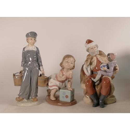 563 - Lladro figures A Christmas Wish Santa Claus and Boy on Knee with Toy Ball 5711, Dutch Boy with Pails... 