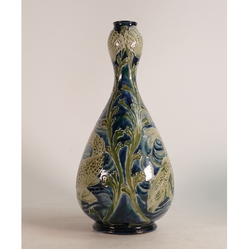 694 - A William Moorcroft (1872-1945) rare Carp vase c1902, signed in green. W MOORCROFT DES,
Tube-lined, ... 