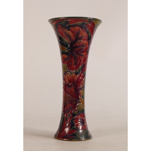 698 - William Moorcroft Burslem vase decorated in the Spanish design, h.19.25cm.