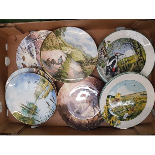 511 - A collection of 13 Royal Doulton bird themed decorative wall plates (1 tray).