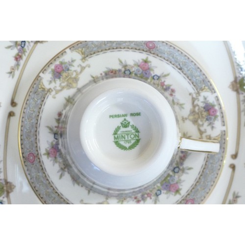 407 - A collection of Minton Persian Rose tea and dinnerware, including tea set, large platters, tureen & ... 