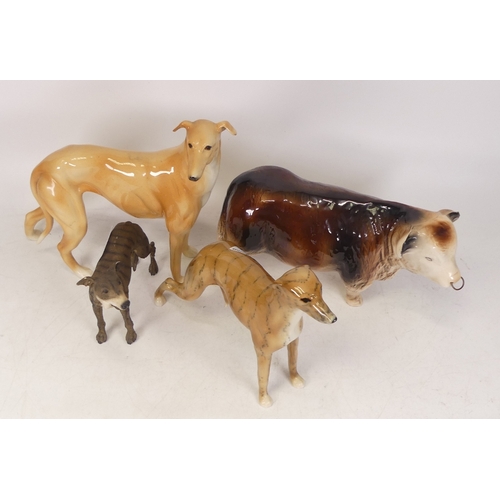 212 - Two unmarked Greyhounds together with a  The Leonardo Collection resin figure of a dog (a/f) and unm... 