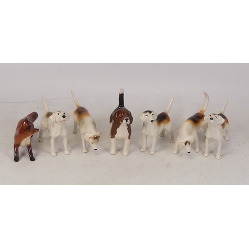 214 - Beswick second version foxhounds to include 2264, 2265, 2262 x2, 2263, beagle and small standing fox... 