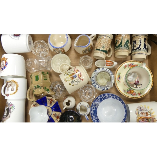 38 - A mixed collection of items to include commemorative mugs, jugs, glassware, etc (1 tray)