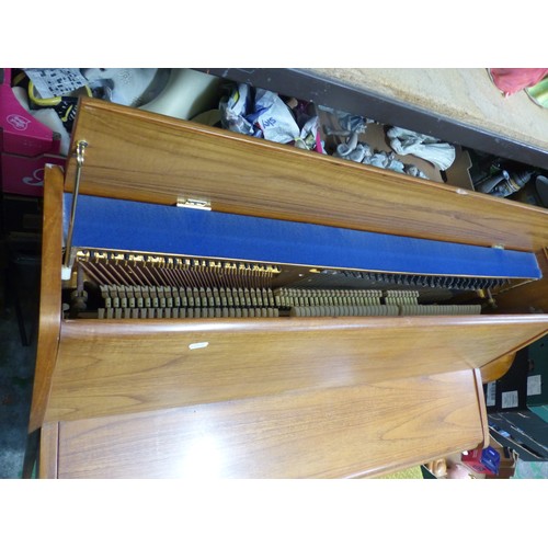 600 - A Bell Upright Piano. Some minor chips to corners and edges noted. Height: 100cm Width: 114cm