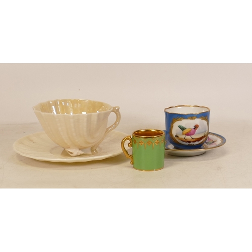 222 - Three Porcelain Cups to include Sevres Celeste Blue Ground Coffee Can with painted reserves of Birds... 