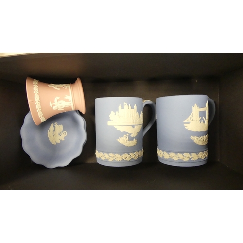 34 - Two Wedgwood jasperware tankards, two scalloped dishes and small flared vase