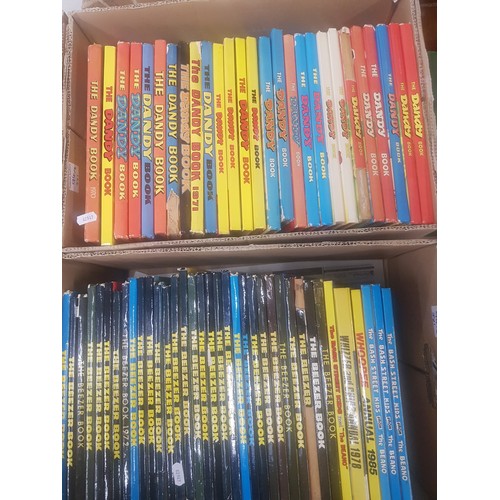 94 - A large quantity of children's annuals from the 1970s/80s & 90s to include The Dandy Book, The Beeze... 